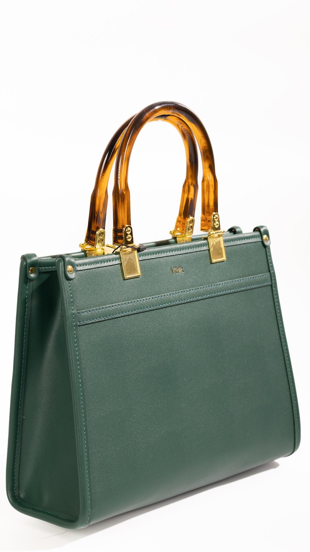 Square handbag with distinctive handle 