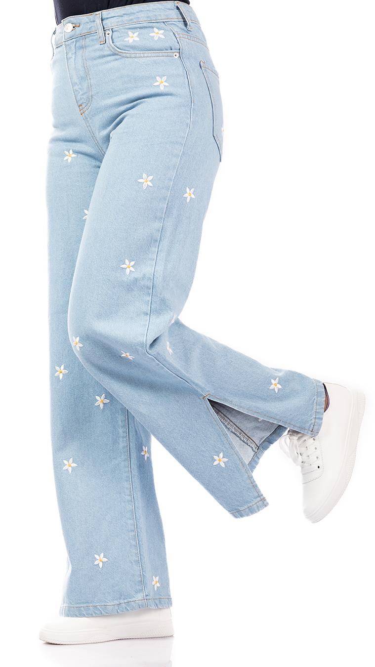 Jeans pants decorated with roses