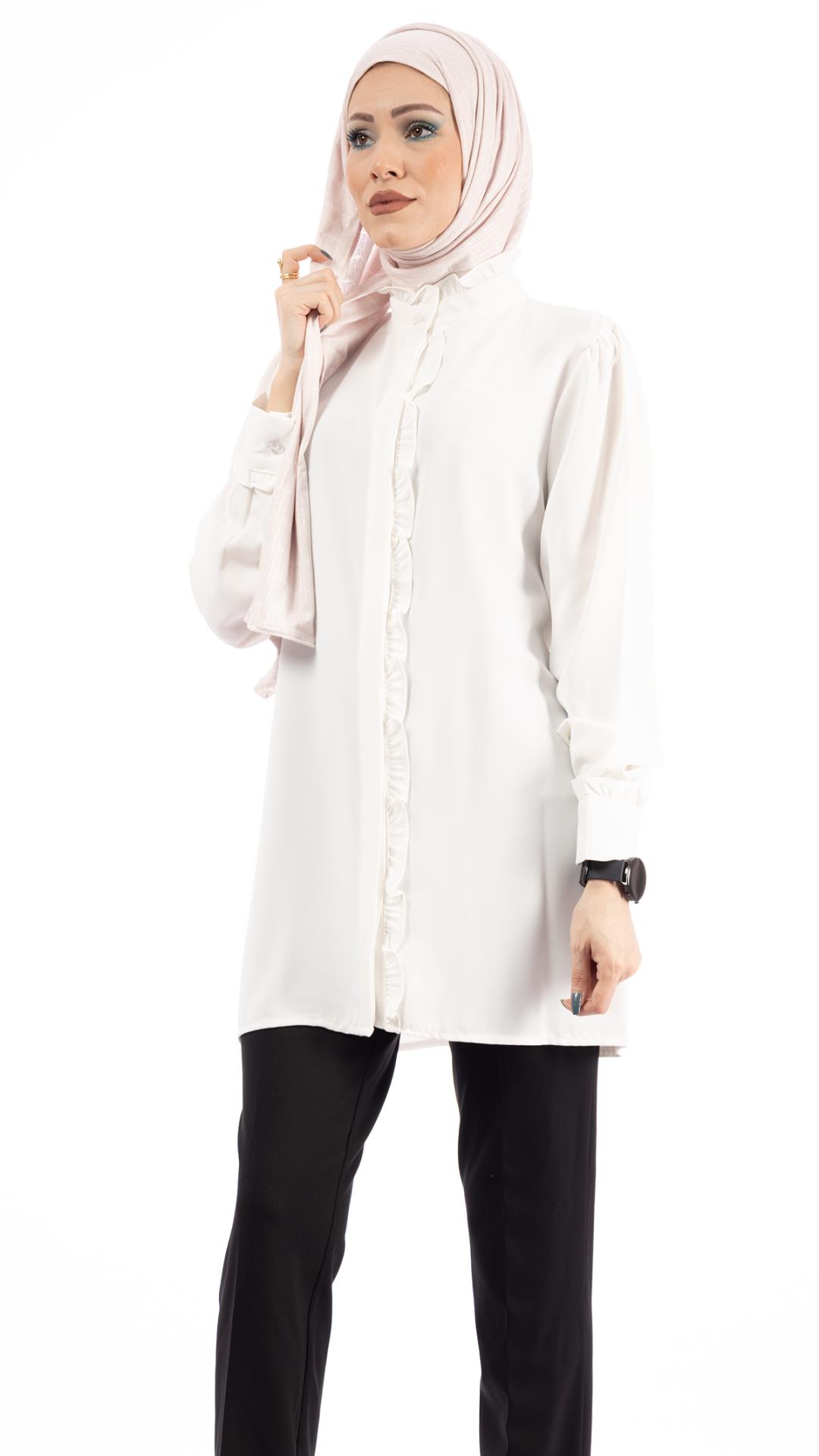Long white blouse with a distinctive story and hidden buttons