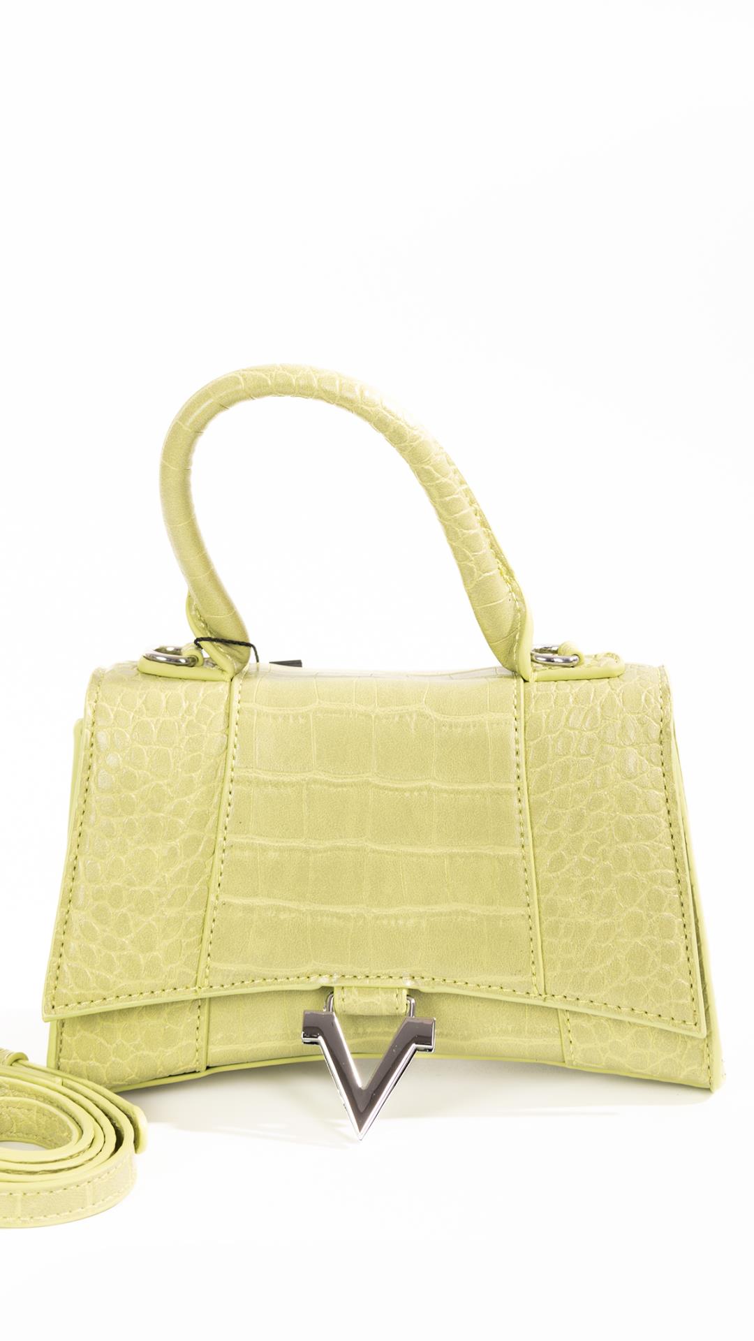 Small handbag with  v shaped accessory