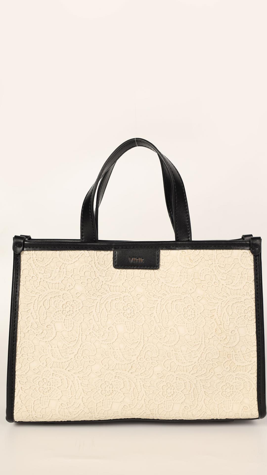 Square handbag with embroidery on the front   